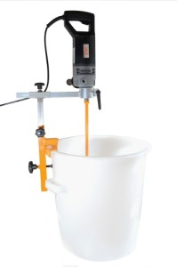 Dispositif de fixation de fût pour machines de malaxage
